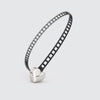 Black bracelet with silver heart clasp