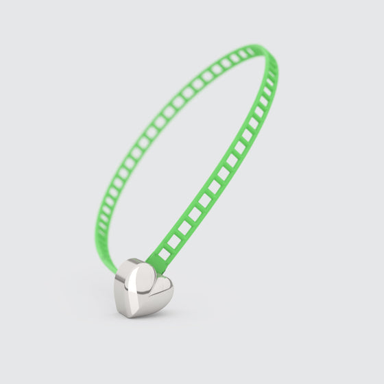 Green bracelet with silver heart clasp