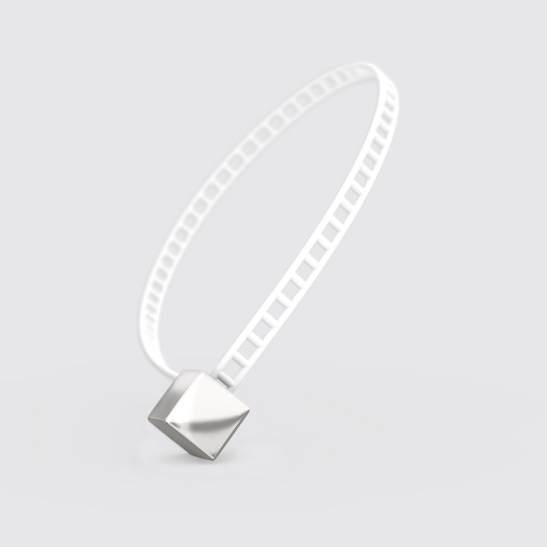 White bracelet with silver cube clasp